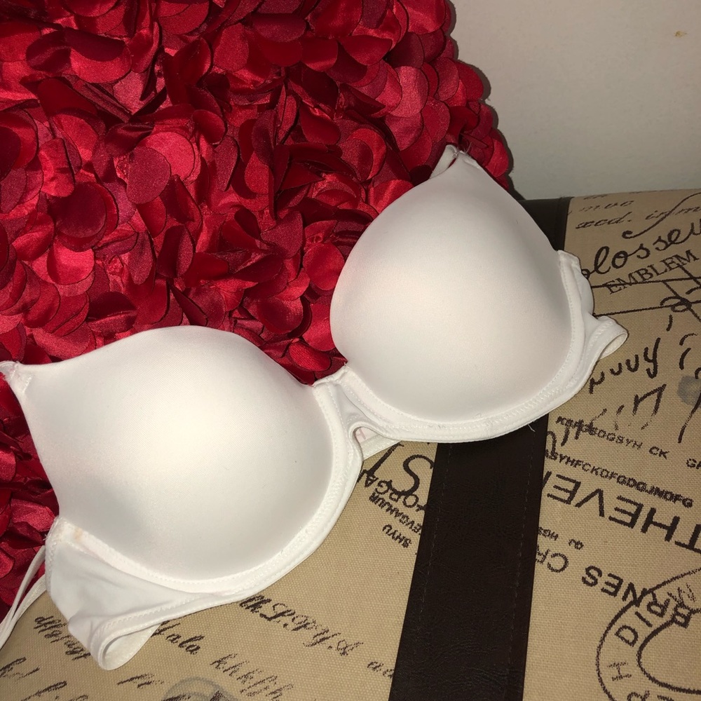 Wear everyone lightly lined pink 34B white bra